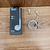 FONE DE OUVIDO COM FIO ( P2 ). ( LELONG )